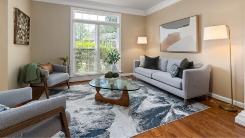 Bright living room featuring stylish furniture and modern design elements