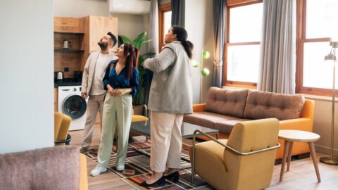 A couple and real estate agent at an apartment inspection