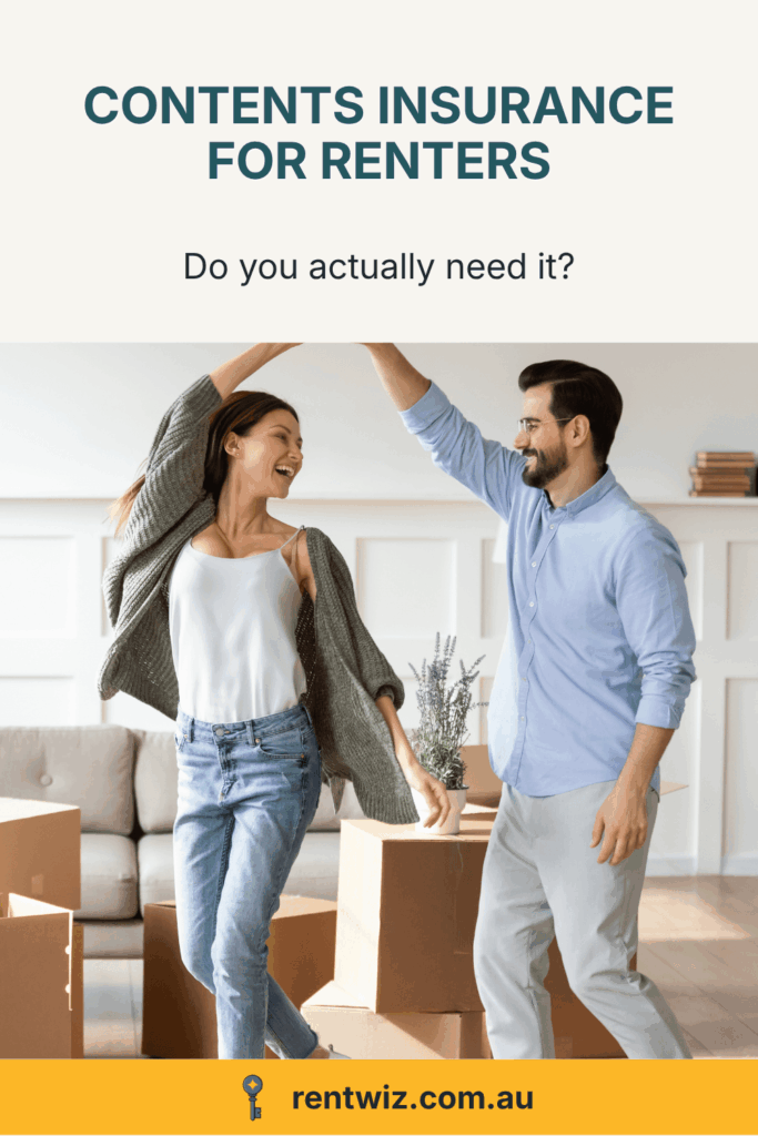 Happy couple dancing in their living area surrounded by moving boxes